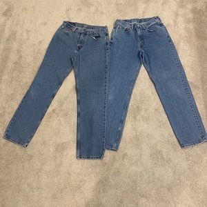 Two pairs of Levi’s 550 Medium Stonewash Blue jeans, size 33 x 34
